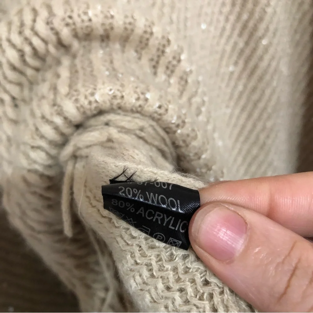 Tan knitted metallic gold fringe hem poncho